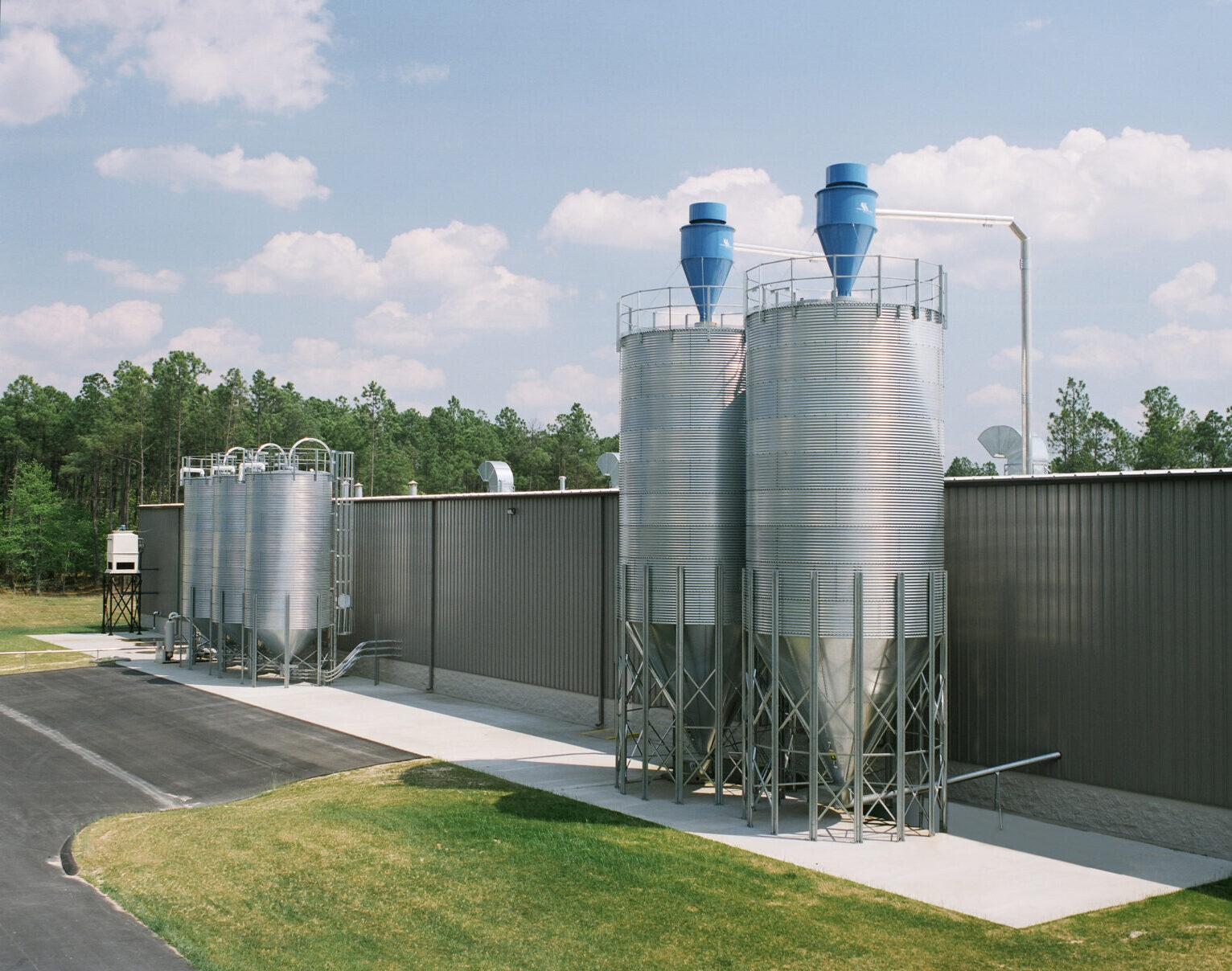 Row of Brock Unskirted Storage Silos